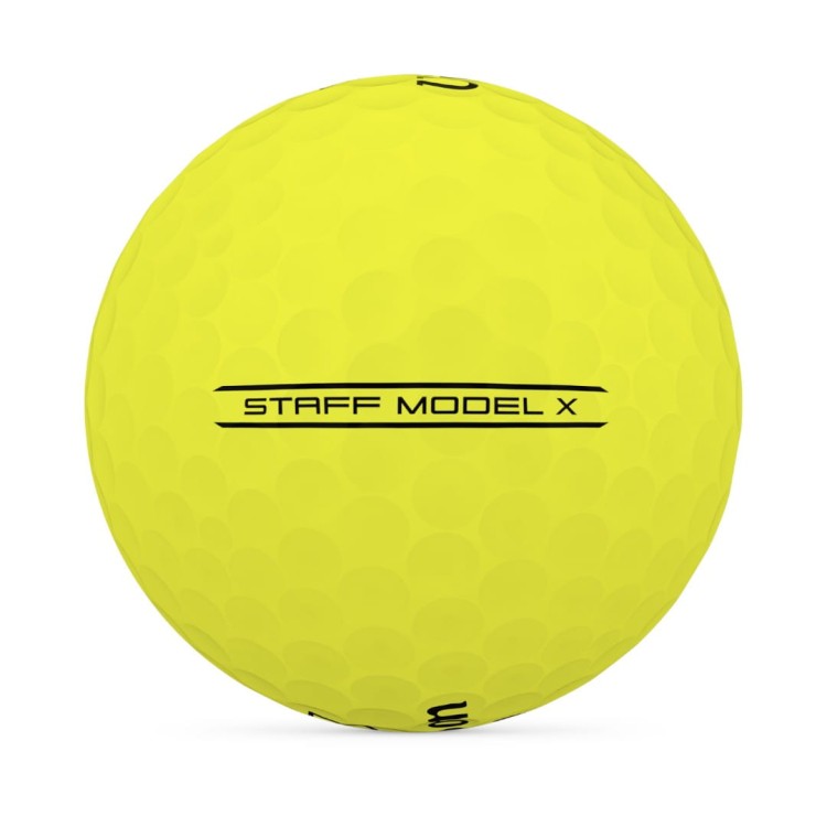 Żółta piłka golfowa Wilson Staff model X yellow - widok z boku